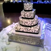 Wright Wedding Alternating rounds and squares, free hand scrollwork/piping in black buttercream. Sizes are 5" Rnd, 7" Sq, 12" Rnd, 15"...