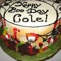 Happy Boo-Day! Side View. This was a cake I did for a 7 year old boy who wanted a Halloween themed cake. Everything is edible. Side view of the same cake.