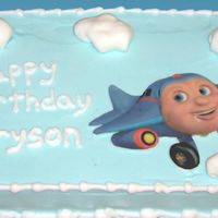 Jay-Jay Cake This was my first edible image plaque. I lost a bit of it on his face but I think it turned out great. The clouds are mmf.