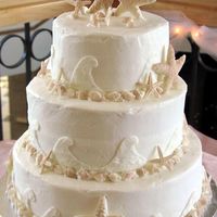 Starfish Wedding Cake This cake was adorned with mmf starfish and shells made from a fondant mold. I airbrushed them lightly to give them a realistic look. Waves...