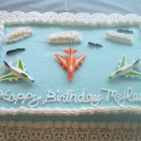 Airplane Birthday Cake French vanilla cake, buttercream icing, toy airplanes