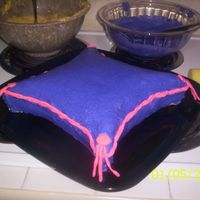 Pillow Cake my first pillow cake. The royal icing tiara fell to peices so I just bought a toy one.