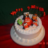 Penguin Birthday Cake For My Mother The penguins are made of fondant and represent differant people in our family. The theme was penguin birthday party, and my favorite parts...