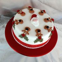 Santa And His Reindeer An 8 inch fruitcake which is being donated to a local scout group to raise money for their Jamboree.Santa and the reindeer are made with...