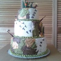 Camo Cake i did this cake for a friends friend. she really liked it and so do i! i did everything by hand and its all buttercream frosting.