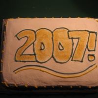 New Years Cake 2 White cake and buttercream...I used crisco and butter flavoring and it actually tasted amazing and came out very white!