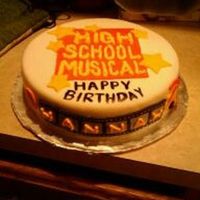 High School Musical High school musical cake for girls bday. 10" round covered in MMF with MMF and BC accents. Stencil is BC.