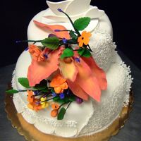 Gumpaste Flowers And Extension Work First gumpaste flowers and extension work as well ashomemade fondant. All done in culinary (pastry) school.