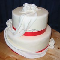 Red Sashes Dummy cake - 6-inch and 8-inch rounds with fondant sashes/roses.