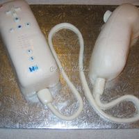 Wii-Mote Strawberry shortcake decorated with fondant.