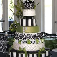 Green Black And White Damask Wedding Cake 7 Tiered cake with damask pattern on two tiers. Embellished with Swarovski rhinestone mongram and a few on the pillowed tier. Bows are...