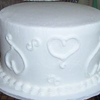 Sample Wedding Cake 6 inch white with b/c icing. Sample cake I took to a bridezilla to drum up some business.