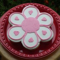 Cupcake Flower Cupcake cake made with seven white cupcakes, buttercream icing. Smoothed using the Melvira method.