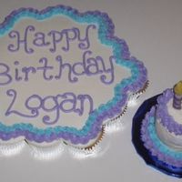 My First Cupcake Cake White cupcakes with buttercream frosting & mini cake on the side for a special two-year old in my life! I have to say, I LOVE making...