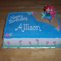 Little Mermaid Quarter Sheet Cake Two layers yellow cake, chocolate filling, buttercream icing, royal icing flowers. Purchased cake topper, sand made with Nilla cookies and...