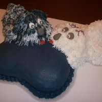 Pillow Talk, Puppy Love I made this for my 2nd wedding anniversary. My husband loves dogs but I'm allergic. All coconut cake w/ coconut buttercream.