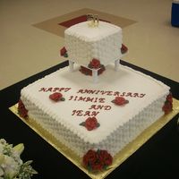 50Th Anniversary This cake was for a couple who celebrated there 50th anniversary along w/ my aunt and uncle's 25th anniversary and there is a matching...
