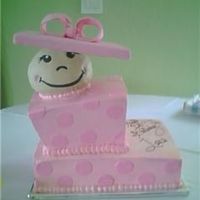 Peek-A-Boo Baby's first birthday. Done just like the invite. Baby peeking out of a gift box