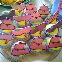 Purse And Heel Cupcakes Vanilla cupcakes with fondant purses and heels.