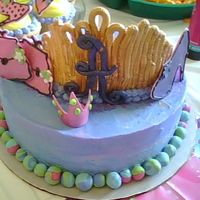 Amanda's Glamour Cake Vanila rum cake with passion filling. Fondant tiara and accents.