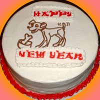 Year Of The Dog cake made in celebration for the Chinese new year. peanut butter cake with strawberry jam filling. the words are FBCT, I'm not...