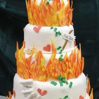 Divorce Cake This was for a competition at the American Bakery Expo. The flames are of gumpaste as well as the money, signs, and "ball & chain&...