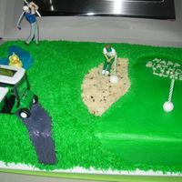 Golf Course This is a little boy "golfing" with his dad using the toppers his mom bought from Giant.