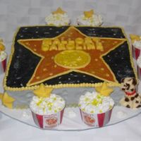 Hollywood Star Cake With Popcorn Buckets This set was for a Hollywood themed birthday party where they watched 101 Dalmatians (that's why there is a dog and cement "paw&...