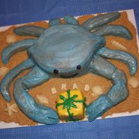 Chesapeake Bay Blue Crab Cake Crab and front claws are vanilla cake with cream cheese and sliced strawberry filling. The small legs are rice krispie treats. All covered...
