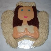 Angel Cake Made for a thank you to a doctor. The wings are rice krispies!