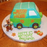 Mystery Machine With Scooby Doo Candle I made this for my son's 5th birthday! It is all BC frosting with the exception of the windows which are made from fondant. The wheels...