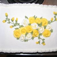 50Th Anniversary Cake This cake goes with the one with the plaque on it. Both cakes are Golden Yellow cakes with buttercream frosting and filling. Yellow and...