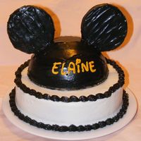 Mickey Ears Cake Inspired by Love2Create's cake. Chocolate cake and buttercream frosting.