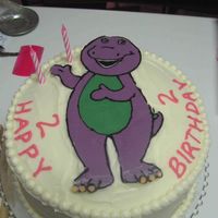 Barney Made this for my daughter's second birthday. She loves Barney. Used the chocolate transfer... should've measure him prior to...