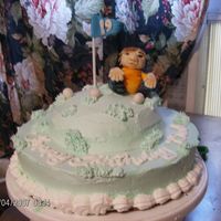 19Th Hole? This is a choc. cake with whipped icing and mmf figure, flag, and golf balls.