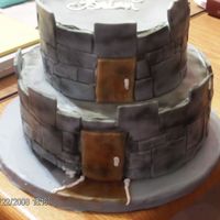 A Quick Castle Cake For My Hubby this is a white and chocolate cake decorated in MMf Icing. I want to thank Rhonda for her MMf formula. It is awesome. This is all edible.