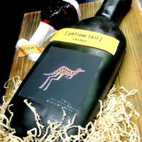 Yellow Tail Made this a few months back the wine glass is also cake decorated and the cake board is wood grain.