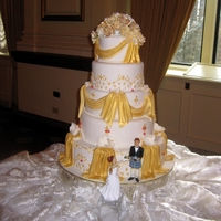 Fairmont Hotel Vancouver 5 tier wedding cake detailed and painted with edible gold.