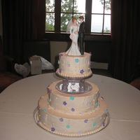 Wedding Cake This is my second wedding cake. It is white cake with rasberry filling. They wanted a white chocolate fondant, but changed their mine at...