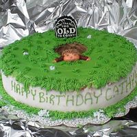 Over The Hill Birthday This is a cake I made for a lady who wanted someone crawling out of a grave. I made this one I had saw it in a wilton book. She loved it....