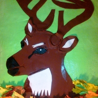Deer Cake I made this for an avid hunters birthday party. Cake is a full sheet cake iced in buttercream, the deer and antlers are made from fondant...