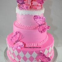 Img_1687_Large_Web_View.jpg Girls Communion. Buttercream with fondant accents.