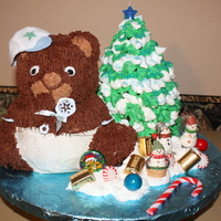Christmas Baby Shower bear cake is pound cake with Kahlua fudge icing. Tree is triple fudge cake with buttercream icing
