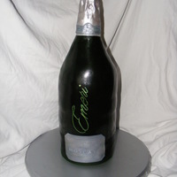Emeri Moscato Wine Bottle Had fun making this cake. Six 6" round stacked and filled. Covered in fondant with edible image
