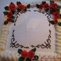 Whipped Cream Birhday Cake This cake is covered with a whipped cream and decorated with a marzipan roses and chocolate pipings. This was for my grandmom's sister...