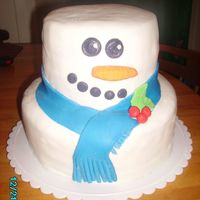 Snowman this cake turned out soooo cute! loved making it. butter cake with buttercream frosting and mmf.