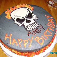 Pict1176.jpg i made this cake for my bro n law.....he's a rough n tough guy so i thought he'd like the skull and flames. i was right he did. i...
