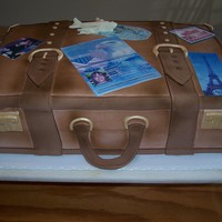 Suitcase Cake 3D leather Suitcase cake complete with edible photos of her travels to 9+ countries. Complete with edible passport and hand scupted...