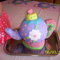 Teapot Cake I made this for my daughter's second birthday. I didn't plan my time well and had some problems with the spout and handle staying...