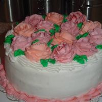 Wilton Level 1 Class 3 This is the second cake we made at class! I decided to just put all my roses on!
